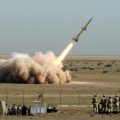 Iran’s Revolutionary Guards carry a missile test out