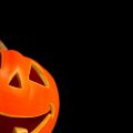 halloween-holiday-pumpkin-black-background-smiling-1920×1080